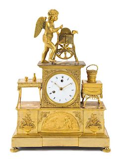 An Empire Gilt Bronze Mantel Clock Height 18 x width 12 1/2 inches.