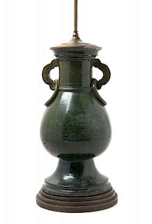 A Green Glazed Porcelain Vase Height overall 26 inches.