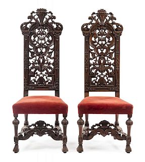 A Pair of Renaissance Revival Walnut Side Chairs Height 54 inches.