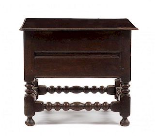 A William and Mary Style Oak Storage Bench Height 17 3/4 x width 20 5/8 x depth 16 3/4 inches.