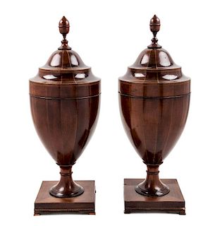 A Pair of George III Mahogany Cutlery Urns Height 24 inches.