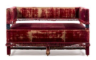 A Velvet Upholstered Settee Height 28 x width 48 x depth 24 1/4 inches.