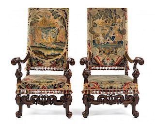 A Pair of Baroque Walnut Armchairs Height 47 1/2 inches.