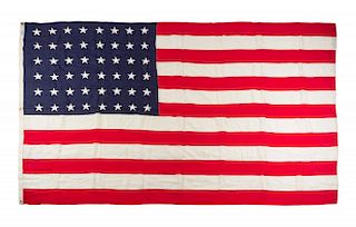 A United States 48-Star Flag Height 5 feet 10 inches x 9 feet 6 inches.