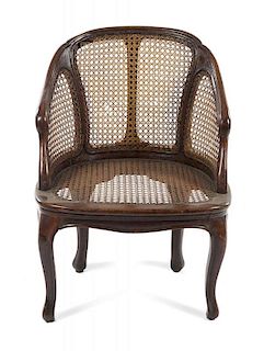 A Provincial Style Caned Bergere Height 29 1/2 inches.
