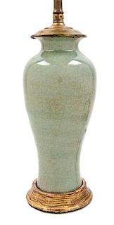 A Celadon Glazed Porcelain Vase Height 20 inches.