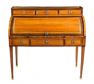A Louis XVI Marquetry Bureau a Cylindre Height 42 x width 44 x depth 23 inches.