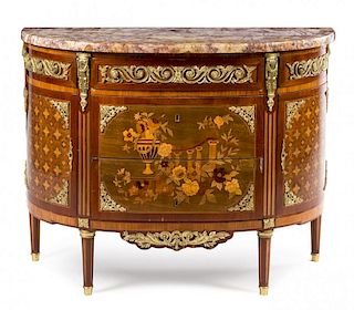 A Louis XVI Style Gilt Bronze Mounted Marquetry Commode Height 36 x width 47 x depth 22 inches.