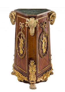An Empire Style Gilt Bronze Mounted Mahogany Pedestal Height 36 x diameter 24 inches.