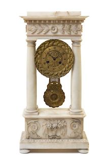 A Charles X Gilt Bronze and Alabaster Mantel Clock Height 20 3/4 inches.