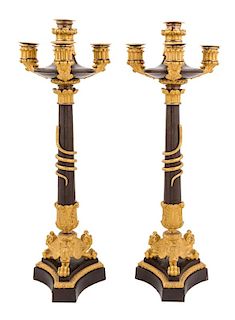 A Pair of Charles X Gilt and Patinated Bronze Four-Light Candelabra Height 31 inches.