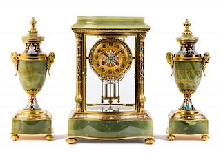 A French Onyx and Champleve Clock Garniture Height of mantel clock 12 5/8 inches.