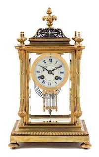 A French Gilt Bronze and Champleve Mantel Clock Height 14 1/2 inches.