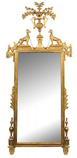 An Italian Neoclassical Carved Giltwood Mirror Height 80 x width 37 inches.