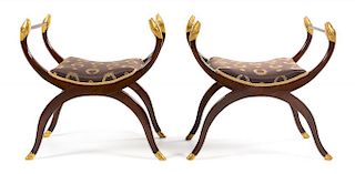 A Pair of Northern Italian Neoclassical Mahogany Parcel Gilt Stools Height 26 7/8 x width 26 1/8 x depth 17 3/4 inches.