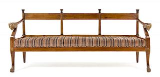 An Italian Parcel Gilt Fruitwood Hall Bench Height 34 7/8 x width 76 1/2 x depth 22 inches.