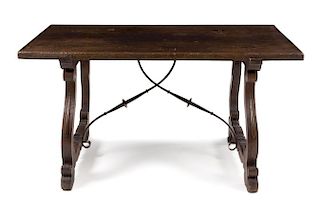 A Spanish Baroque Wrought Iron Mounted Walnut Trestle Table Height 30 7/8 x width 60 x depth 33 1/8 inches.