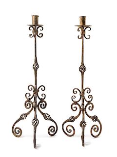 A Pair of Spanish Baroque Gilt Wrought Iron Prickets Height of tallest 32 3/4 inches.