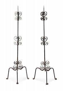 A Pair of Spanish Baroque Wrought Iron Prickets Height 60 1/2 inches.