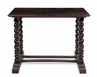 A Spanish Baroque Carved Chestnut Side Table Height 36 x width 48 x depth 15 3/4 inches.