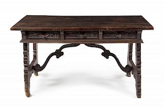 A Spanish Baroque Walnut Trestle Table Height 31 3/4 x width 59 1/2 x depth 28 3/4 inches.