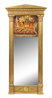 A Gustavian Neoclassical Style Faux Wood-Painted and Carved Giltwood Mirror Height 73 1/2 x width 35 inches.