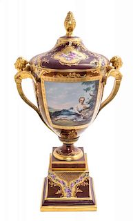 A German Porcelain Urn Height 20 inches.