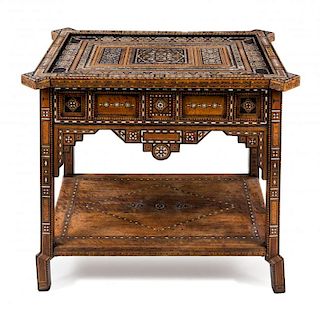 A Syrian Parquetry and Mother-of-Pearl Inlaid Table Height 31 3/4 x width 39 1/2 x depth 36 inches.