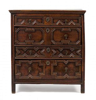 A Charles II Oak Chest of Drawers Height 39 1/2 x width 36 1/2 x depth 20 1/2 inches.