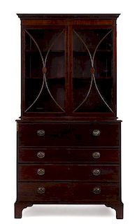 A George III Mahogany Secretary Bookcase Height 81 1/2 x width 43 3/4 x depth 21 1/2 inches.