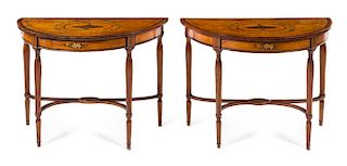 A Pair of Edwardian Painted Satinwood and Marquetry Console Tables Height 29 x width 40 x depth 18 1/2 inches.
