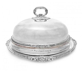 A Victorian Silver-Plate Cloche and Tray, Circa 1860, the cloche having a foliate decorated handle and a gadroon collar, the