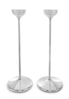 A Pair of English Silver Candlesticks, Robert Welch, Birmingham, 1967, each having elongated cylindrical stems ending in circ