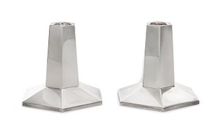 A Pair of Frank Lloyd Wright Designed Candlesticks, Pampaloni Argenti, Florence, for Tiffany & Co., having a tapering octagon