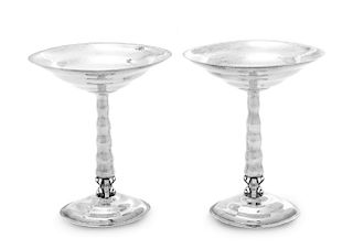 A Pair of American Silver Compotes, Reed & Barton, Taunton, MA, 1928, each having spot-hammered decoration, the elongated ova