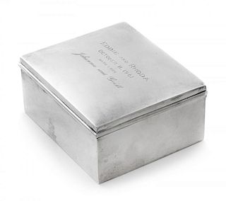 An American Silver Cigarette Box, Andrew A. Taylor, Newark, NJ for Cartier, of square form with a wood-lined interior, the li