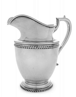 An American Silver Water Pitcher, Lebkuecher & Co., Newark, NJ, the shoulder and foot with gadroon banding.