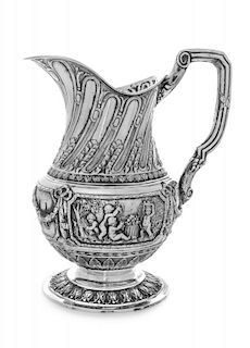 A German Silver Water Pitcher, Maker's Mark square bisected diagonally, 20th Century, having a gadroon neck with foliate band