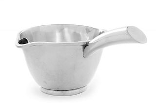 A Mexican Silver Sauce Boat, Juvento Lopez Reyes, Mexico City, the body having twin spouts, one spout with an applied cover.