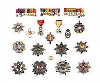 A Collection of European Orders of Merit Medals Width of largest 3 1/2 inches.