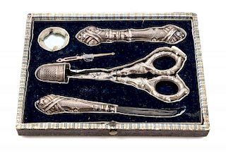 A Victorian Silver Needlework Compendium Length of scissors 4 3/4 inches.