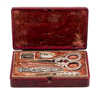A Victorian Silver Needlework Compendium Width of case 5 inches.