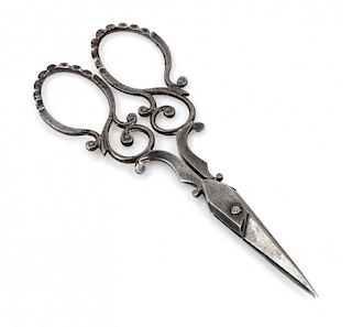 A Pair of Steel Scissors Length 3 3/8 inches.