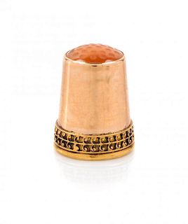A Continental 18 Karat Yellow Gold Thimble Height of thimble 1 3/4 inches.