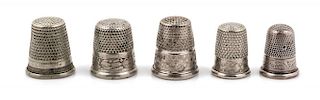 Five Silver-Tone Thimbles Height 7/8 inch.