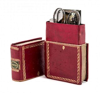 A Leather Cased Necessaire Height 4 inches.