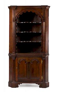 An American Federal Walnut and Pinewood Corner Cabinet Height 86 1/4 x width 45 x depth 22 inches.