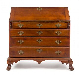 A Chippendale Cherry Slant-Front Bureau Height 44 x width 43 1/2 x depth 20 inches.