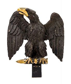 An American Carved Giltwood Figure of an Eagle Height 13 1/2 x width 14 1/2 inches.