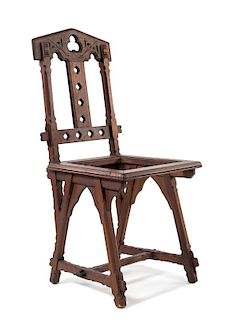 A Walnut Patent Gothic Star Chair Height 38 inches.